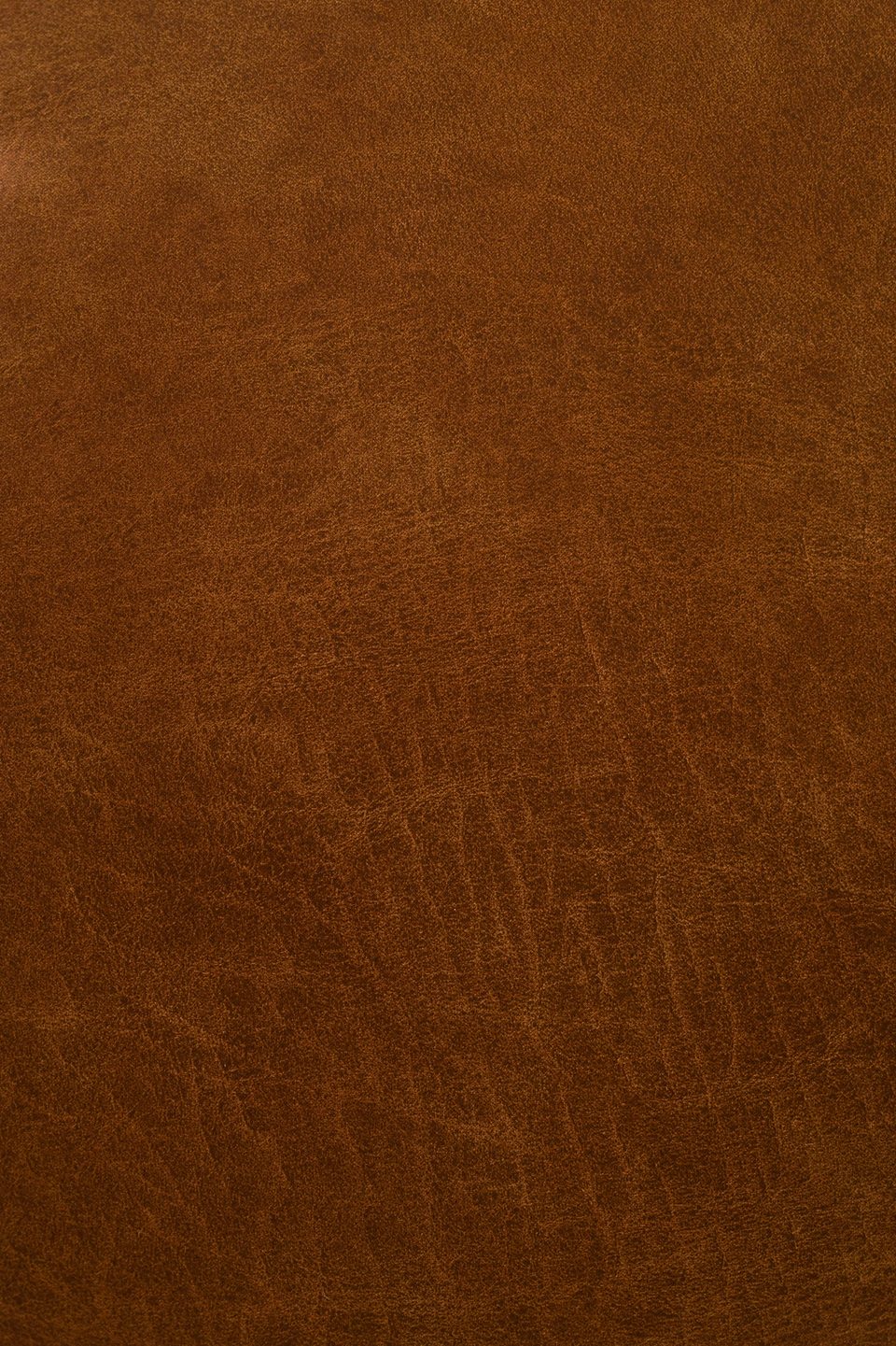 Cuir marron patiné, en gros plan
